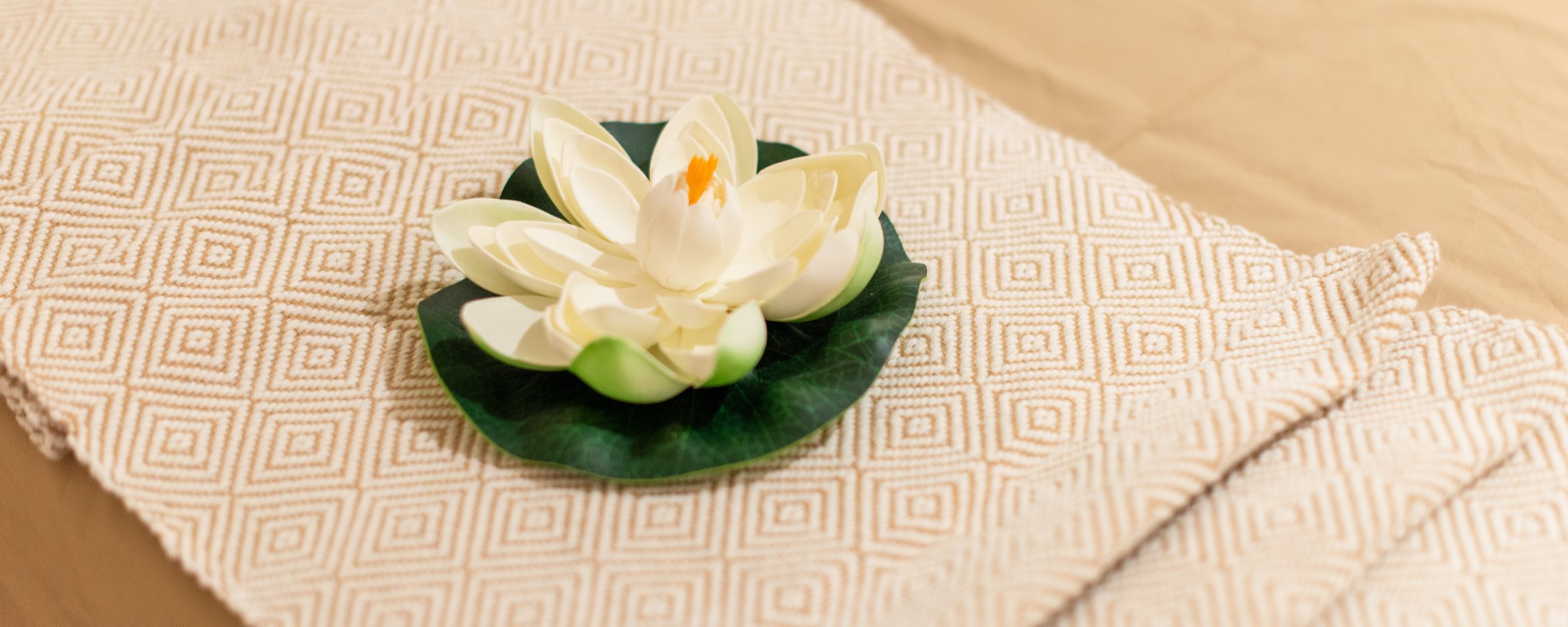 White Lotus flower of Chandee in the white bed sheet
